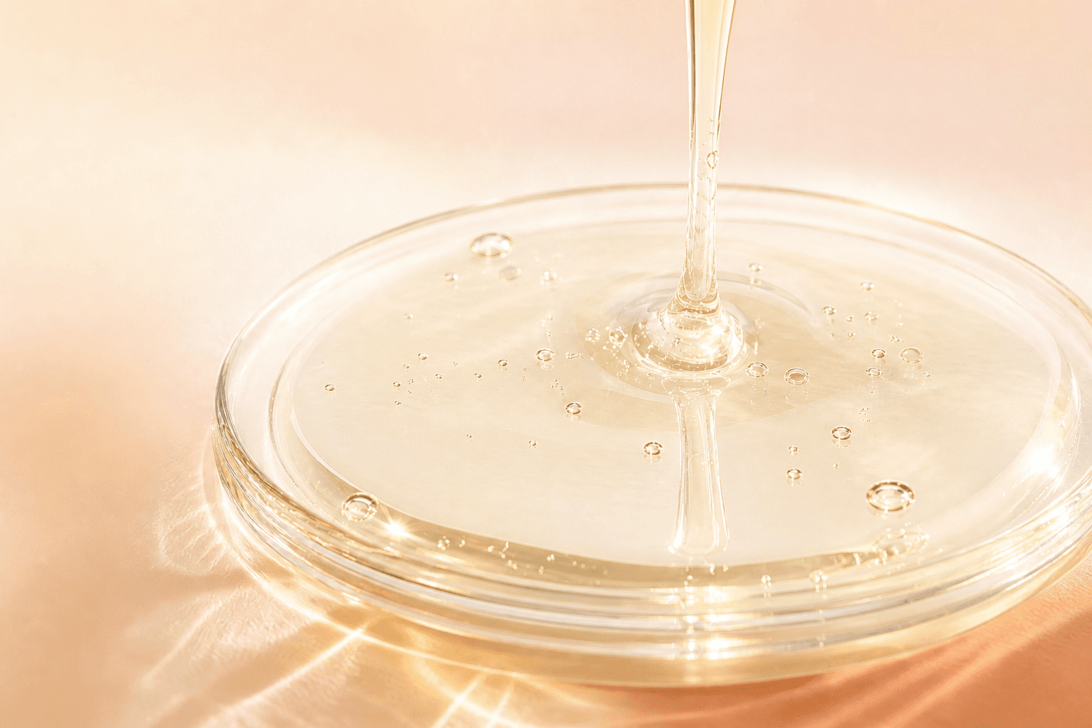 Macro close-up of a fresh pale vitamin C serum texture